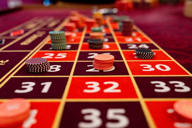 Live dealer at Speed Roulette table with spinning wheel and betting layout